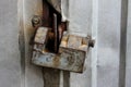 Rusty door lock. Antique rusty lock on a medieval wooden door