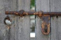 Rusty door lock on wooden door Royalty Free Stock Photo