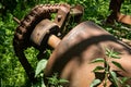 Rusty driving gears with chain on a old mine train wagon Royalty Free Stock Photo