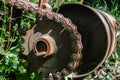 Rusty driving gears with chain on a old mine train wagon