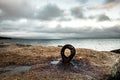 Rusty Eyebolt in the Rocks of Rockland Breakwater Royalty Free Stock Photo