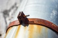 Rusty fastening drainpipe with bolt and nut Royalty Free Stock Photo