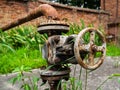 Rusty faucet on the pipe. Water pressure supply