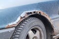 The rusty fender of the car. Royalty Free Stock Photo