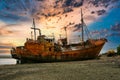 Rusty fishing boat stranded in the port of San Antonio Oeste Royalty Free Stock Photo