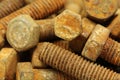 Rusty fixing bolts background Royalty Free Stock Photo