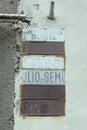 Rusty Food-stuff Signs On Wall Of Old Grocery Store, Montefiascone, Viterbo, Italy