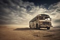 Rusty frame of an old bus standing on an empty road with clouds of dust around Royalty Free Stock Photo