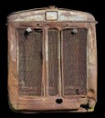 Rusty front grille of a vintage farmer tractor of production of the beginning in the middle of the 20th century isolated