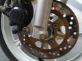 rusty front wheel motorcycle disc brake Royalty Free Stock Photo