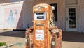 Rusty gasoline pump in an abandoned fuel station, sunny spring day. USA Royalty Free Stock Photo