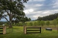 Rusty gates open to an Australian countryside landscape Royalty Free Stock Photo