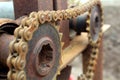 Rusty gear with chain for the movement of the mechanism