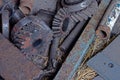 Rusty gears of a reducer in an abandoned workshop