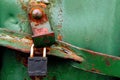 rusty green metal texture of cargo container with lock and bolt Royalty Free Stock Photo