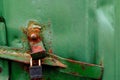 Rusty green metal texture of cargo container with padlock Royalty Free Stock Photo