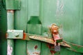 Rusty green metal texture of cargo container with padlock Royalty Free Stock Photo