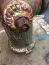 Rusty green and yellow fire hydrant grunge grafitti Royalty Free Stock Photo