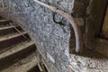 Rusty handrail in derelict building