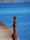 Rusty handrail and sea Royalty Free Stock Photo