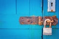 Rusty hasp with padlock