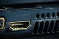 Rusty HDMI port of computer notebook in darkness.