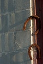 Rusty Horseshoes on Rusted Nails Royalty Free Stock Photo