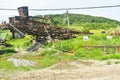 Rusty huge machines in abandoned coal mine. Heavy industry decay in Romania