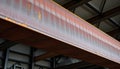 Rusty Industrial Beam in a Warehouse with Peeling Paint Close Up Royalty Free Stock Photo