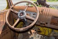 Rusty interior and steering wheel of an antique truck Royalty Free Stock Photo