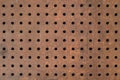 Rusty iron background with holes
