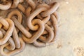 Rusty iron chain on concrete floor Royalty Free Stock Photo