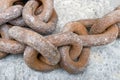 Rusty iron chain on gray background Royalty Free Stock Photo