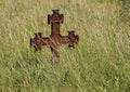 Rusty Iron Cross at Ancient Graveyard