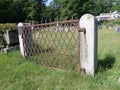 Rusty iron fence guarding the old burial ground of 1745-1791 Boylston, Ma Royalty Free Stock Photo