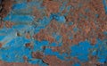 Rusty Iron Finials on Old Fence with Flaking Blue Paint