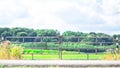 rusty iron gate in front Dutch landscape Royalty Free Stock Photo