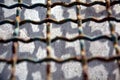 Rusty iron net decaying wall abstract background, craps and holes, abstract background Royalty Free Stock Photo