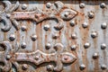 Rusty iron plate with rivets Royalty Free Stock Photo