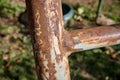 Rusty iron pole as part of a metal staircase Royalty Free Stock Photo