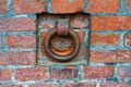 A rusty iron ring in an old brick wall Royalty Free Stock Photo