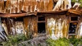 Rusty iron shed with a fallen roof