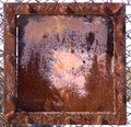 Rusty iron shield with bolts