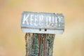 Rusty Keep Out private property sign Royalty Free Stock Photo