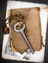 Rusty key, old book and empty photography as a memories metaphor Royalty Free Stock Photo