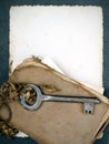 Rusty key, old book and empty photography Royalty Free Stock Photo