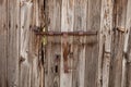 Rusty latch on an old wooden door Royalty Free Stock Photo