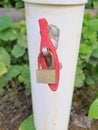 Rusty Lock on a public water tap