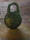 Rusty lock on a rusty table Royalty Free Stock Photo