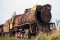 Rusty locomotive standing on a railway siding, Krakow, Poland